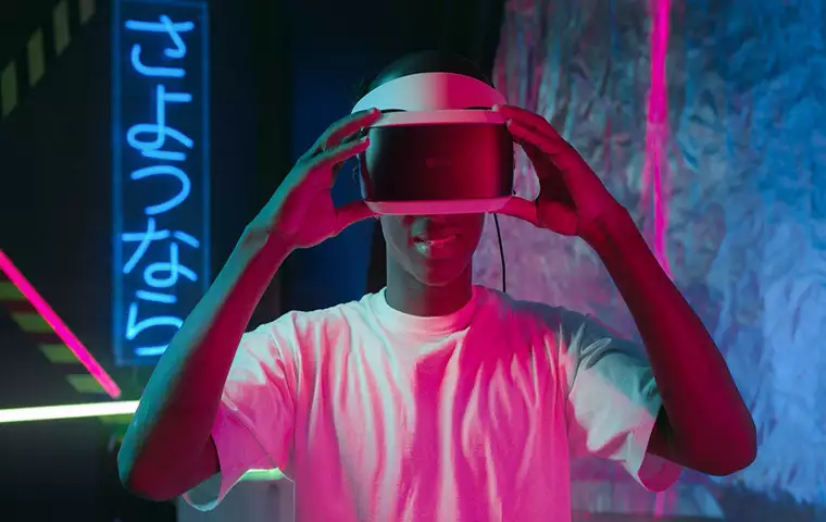 A man is using a virtual headset